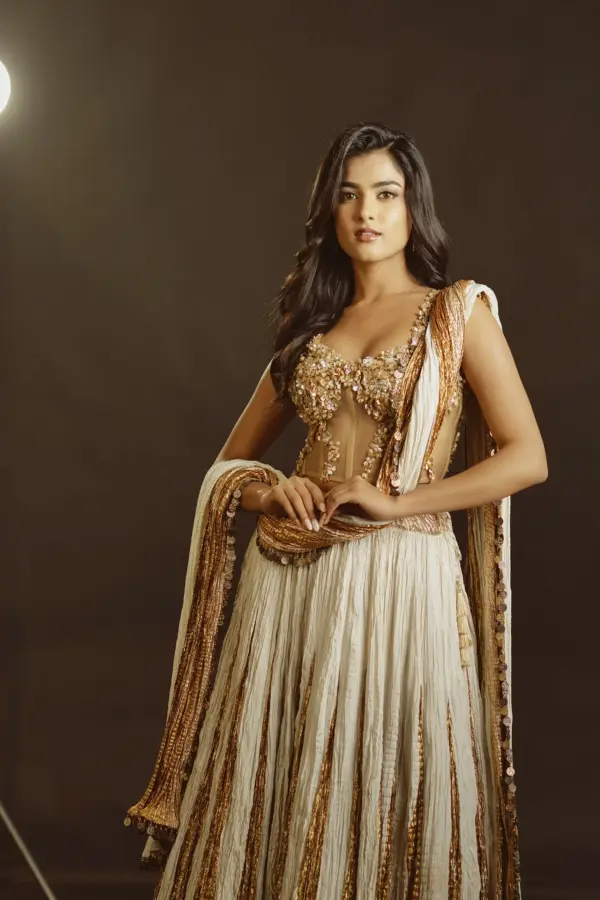 Nikita Porwal in Whie and gold metallic lehenga 3d floral embellished corset set
