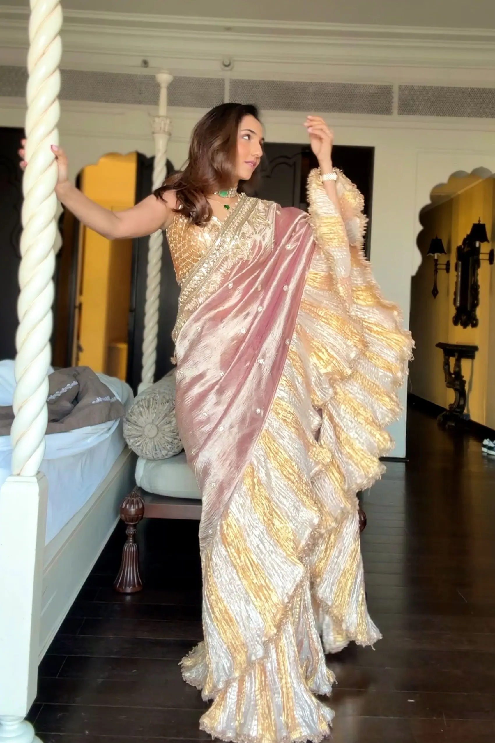 Masoom Minawala in a salmon embellished tissue metallic saree set - Image 2