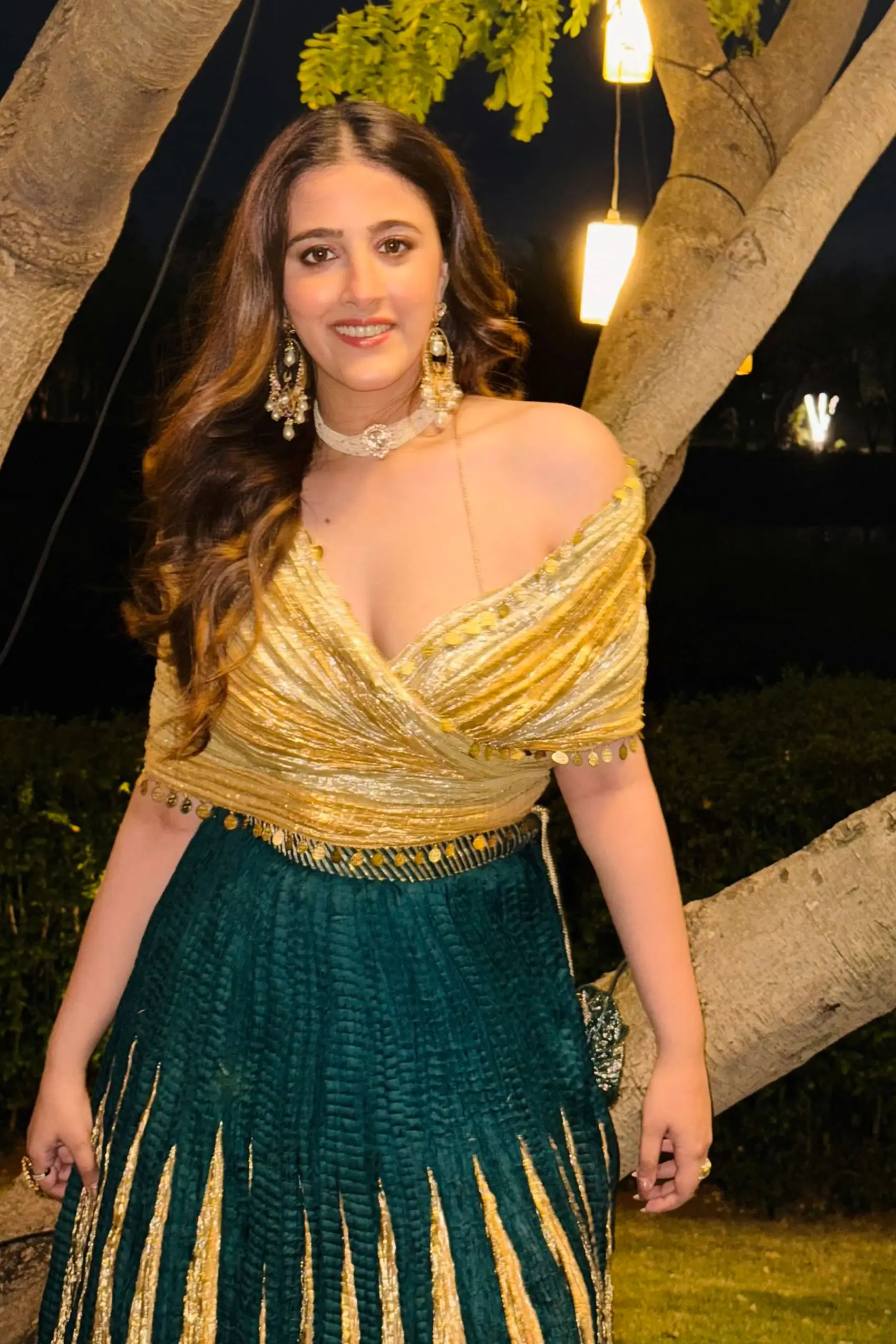 Nupur Sanon in bottle green lehenga with wrap around metallic blouse - Image 2