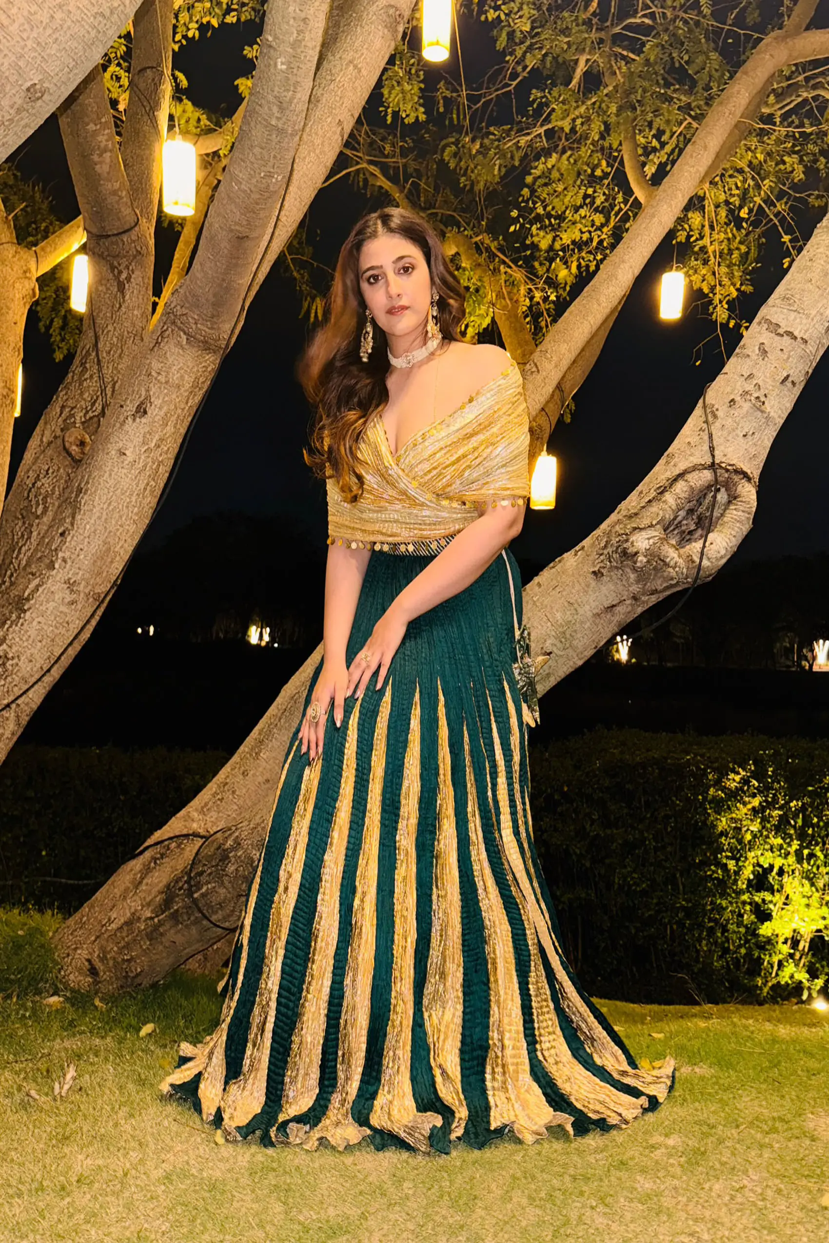 Nupur Sanon in bottle green lehenga with wrap around metallic blouse - Image 3