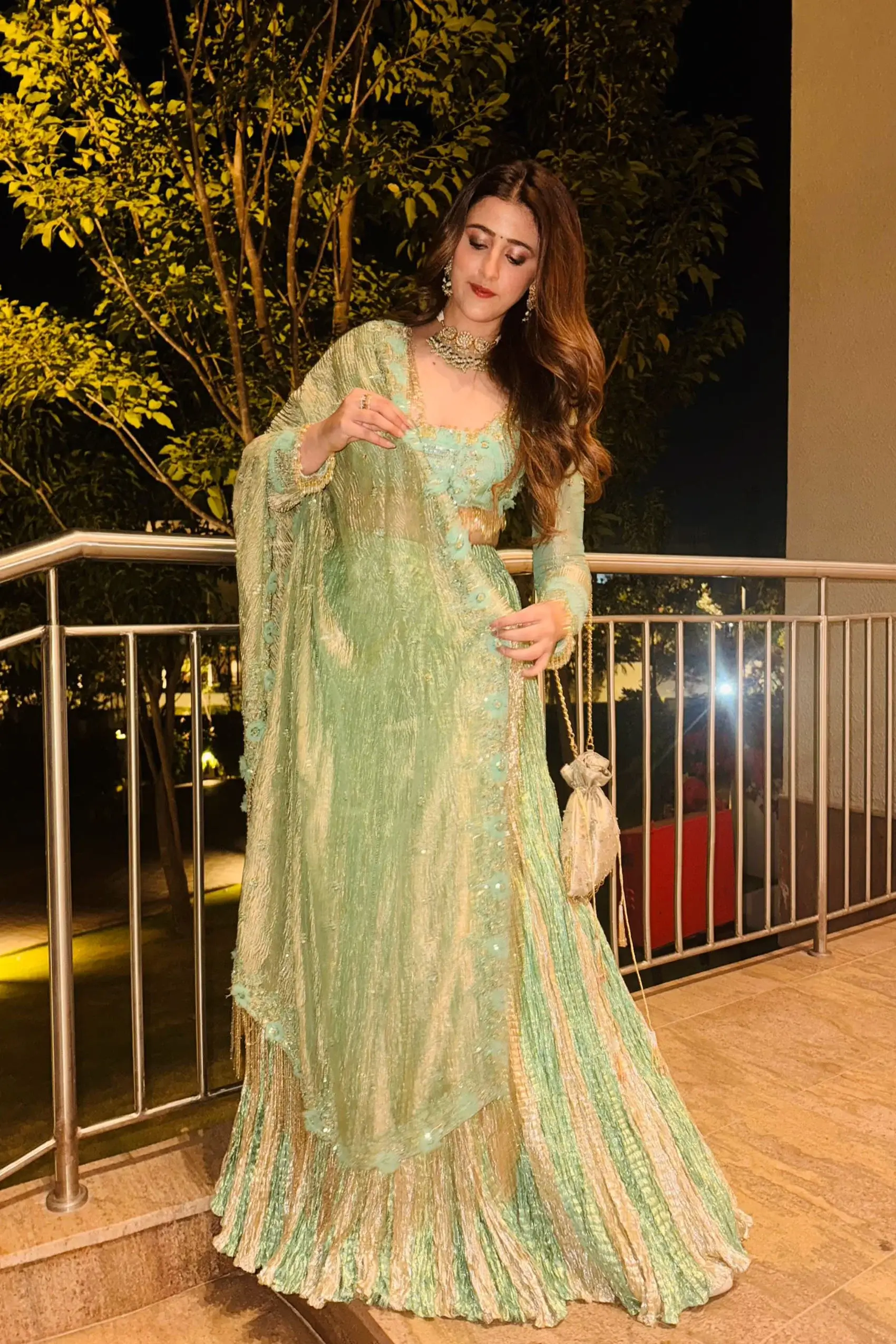 Nupur sanon in a sea green metallic drape embelished saree set - Image 4