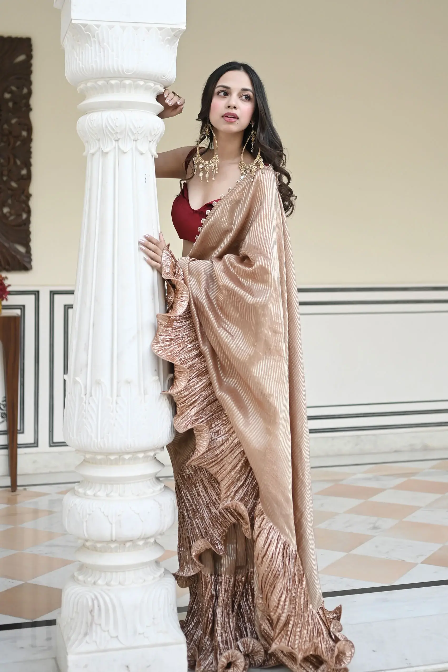 Nitanshi Goel in a Champagne tissue and metallic saree - Image 4