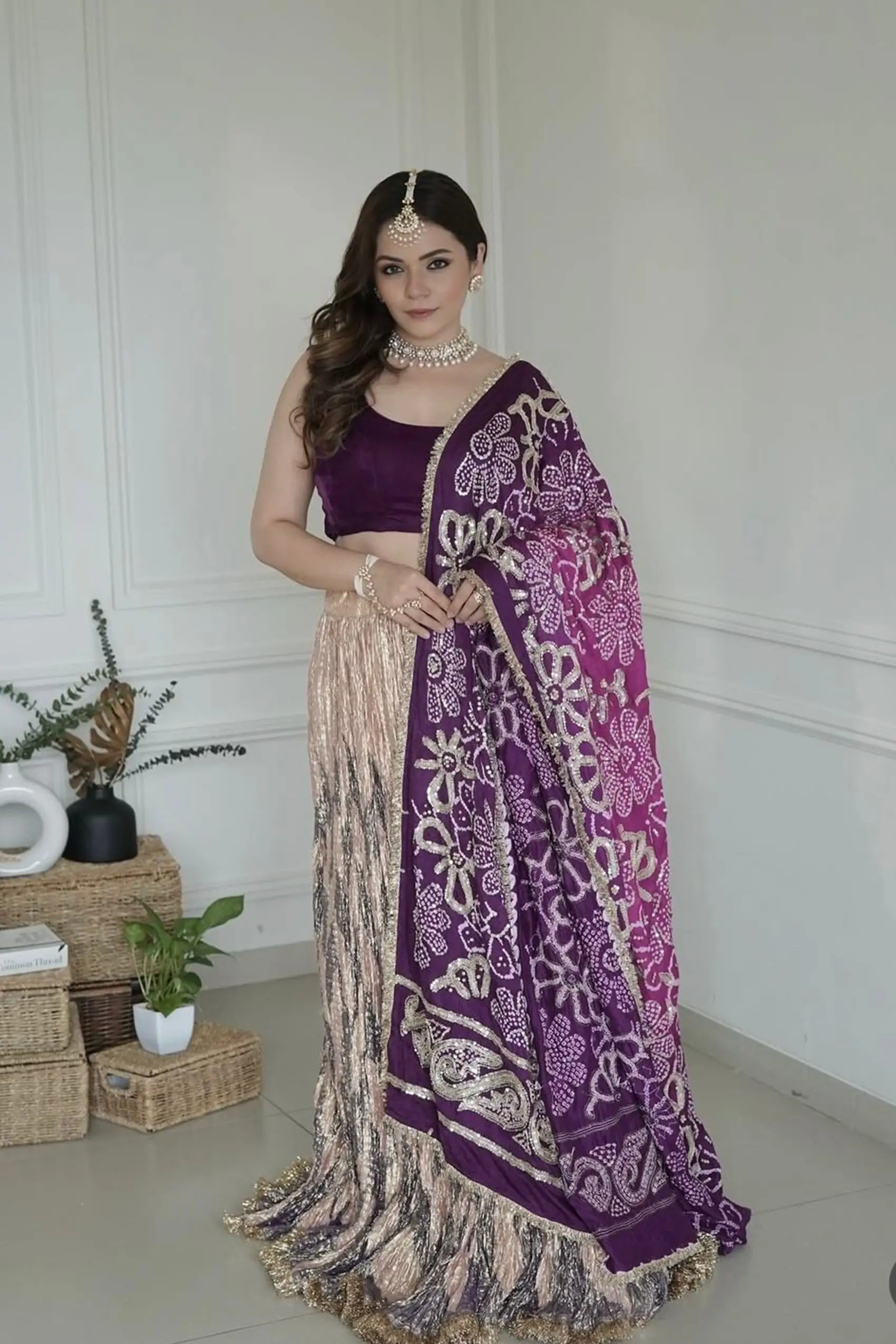 Hena Somani in a Chevron Textured metallic lehenga and embellished bandhani dupatta set